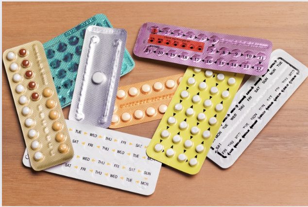 Image of a table with various oral contraceptive pills